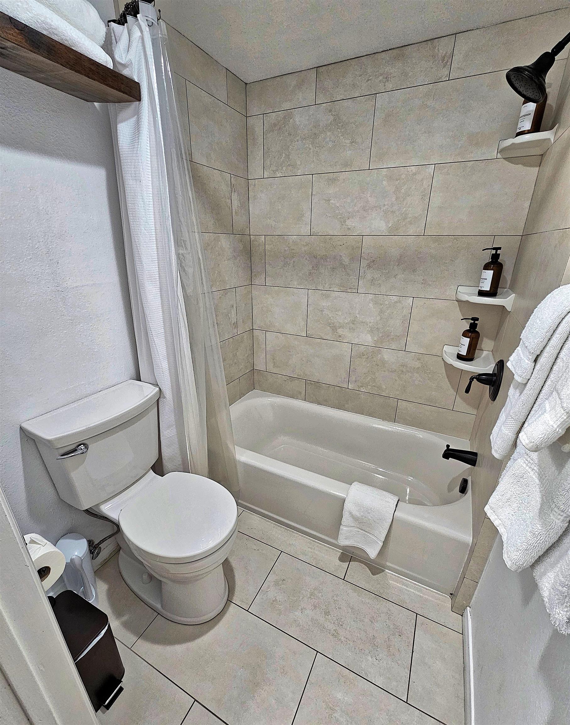 3253 Meridian Boulevard, Unit 246 Mammoth Lakes, CA 93546 - Photo 23 of 36 a bathroom with a toilet and a shower