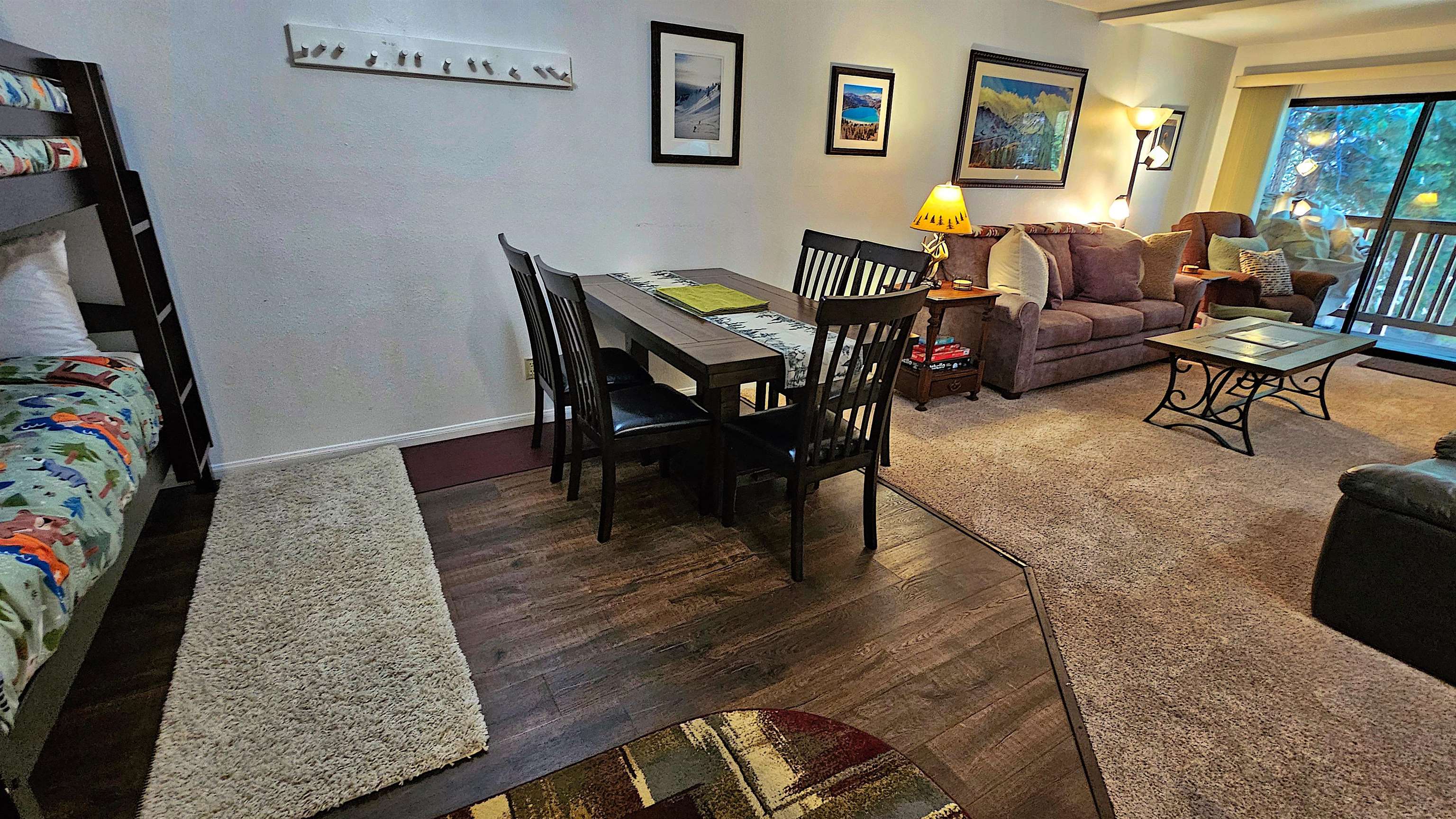 3253 Meridian Boulevard, Unit 246 Mammoth Lakes, CA 93546 - Photo 8 of 36 a living room with furniture and wooden floor