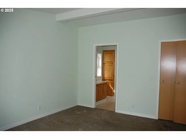 a view of cabinet with wooden floor