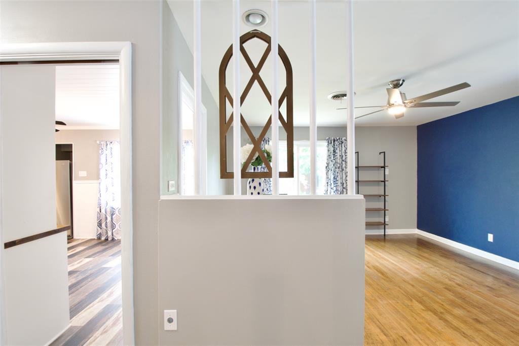 1307 North 65th Street Waco, TX 76710 - Photo 6 of 35 a view of an entryway with wooden floor and door