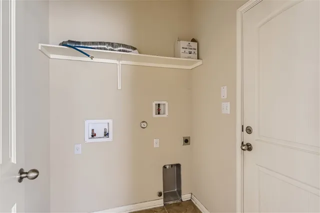 a view of a storage & utility room with washer dryer