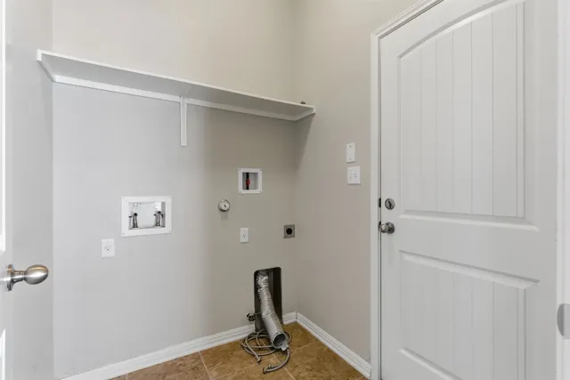 a living room with a sink and a mirror