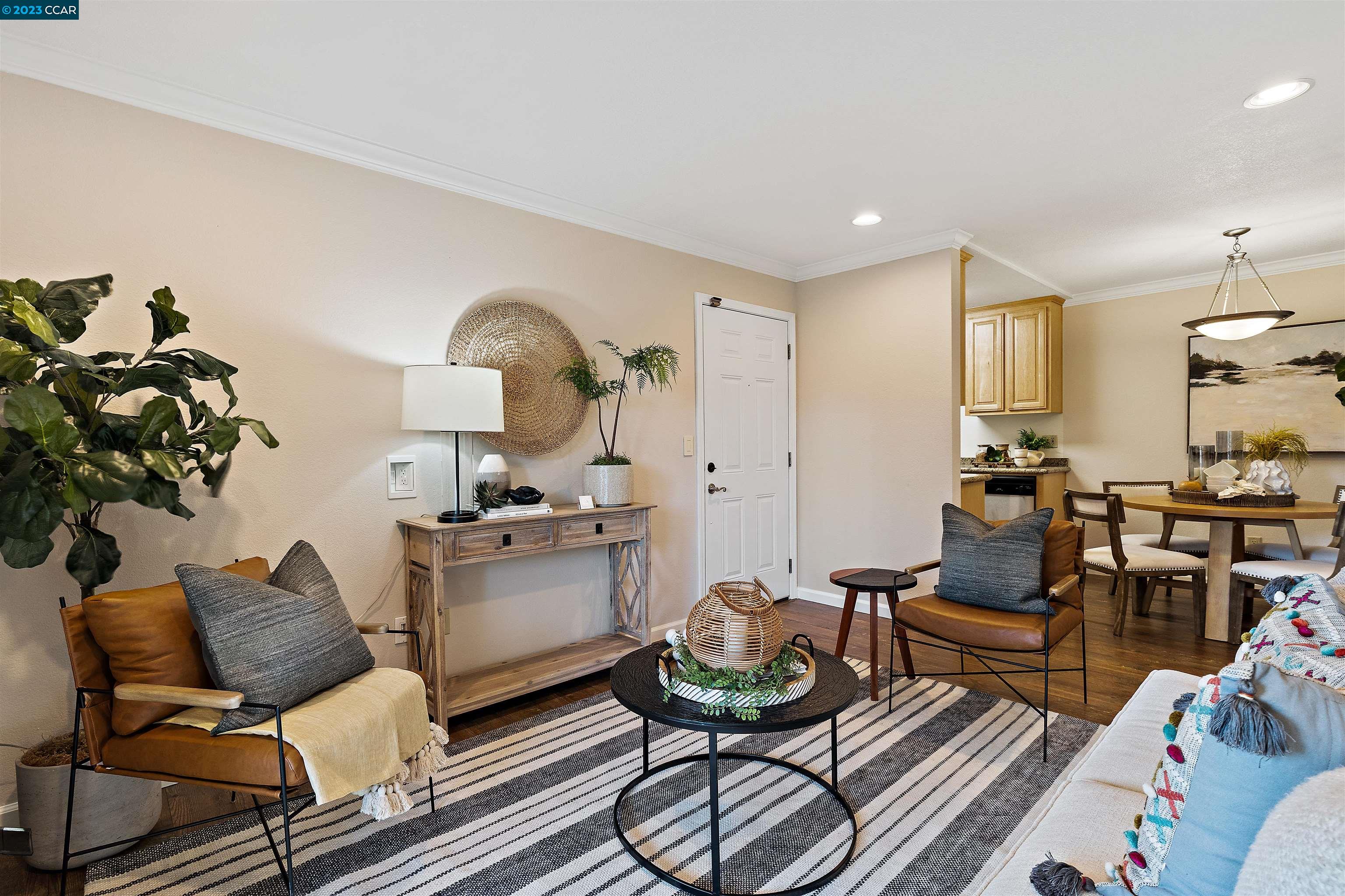 1505 Kirker Pass Road, Unit 103 Concord, CA 94521 - Photo 1 of 1 a living room with furniture and wooden floor