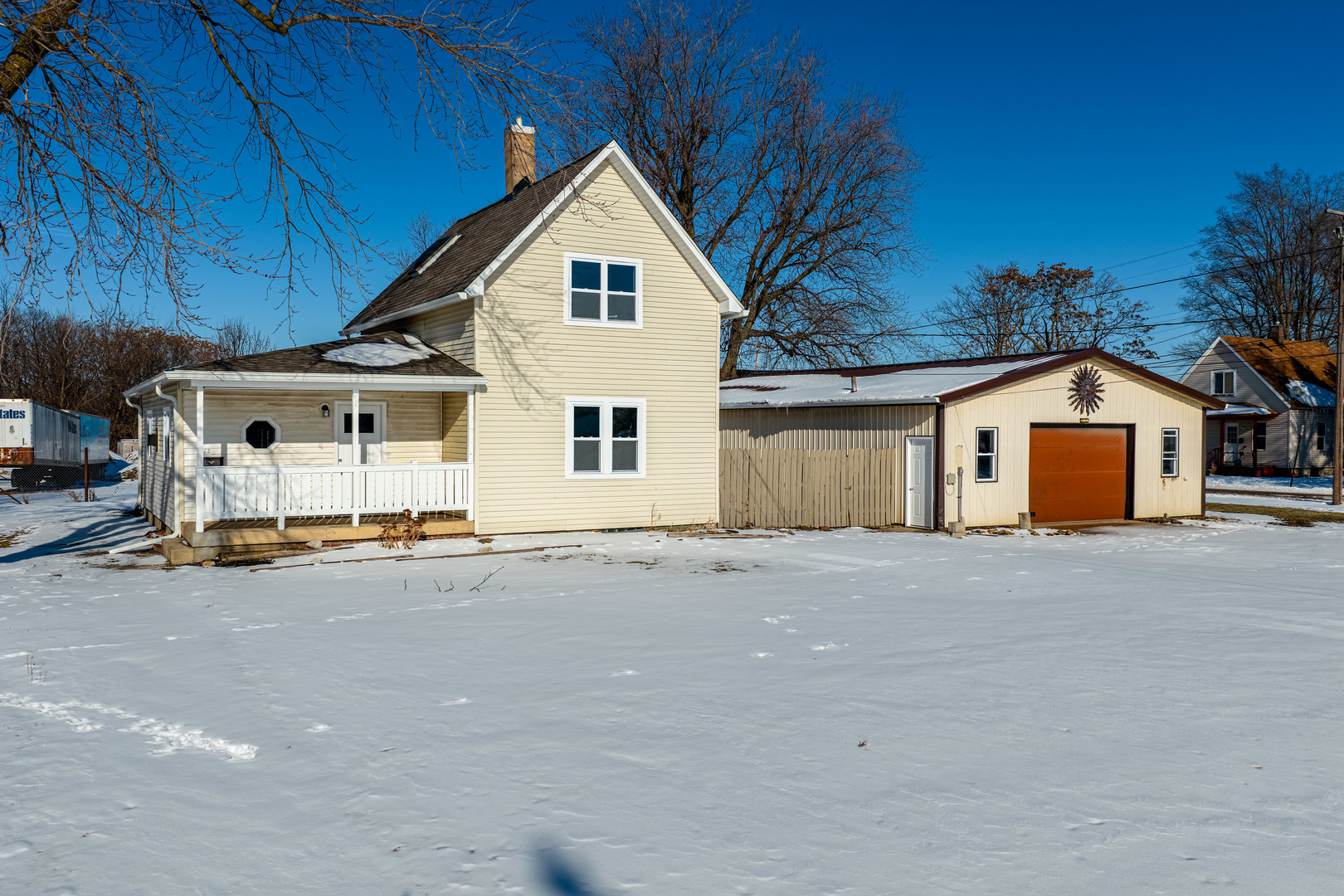 522 East 5th Street Kewanee, IL 61443 - Photo 17 of 21 a view of a house with a yard and garage