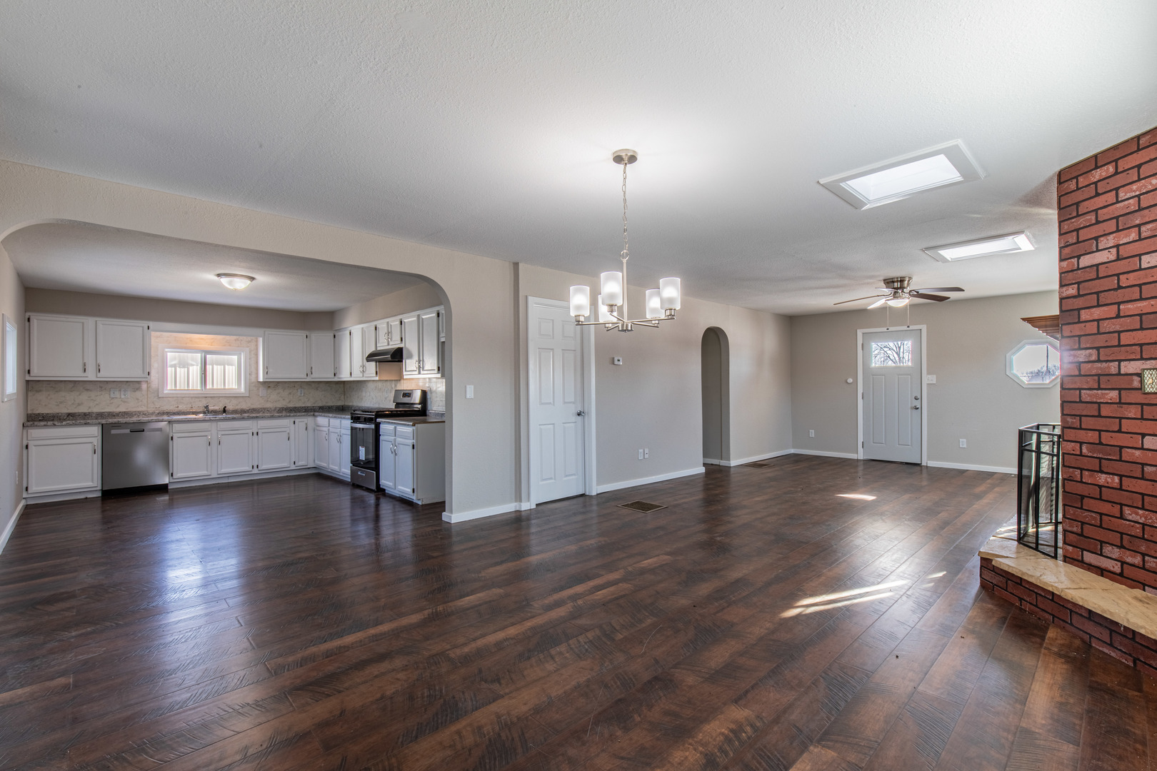 522 East 5th Street Kewanee, IL 61443 - Photo 6 of 21 a view of a kitchen with a sink and a stove