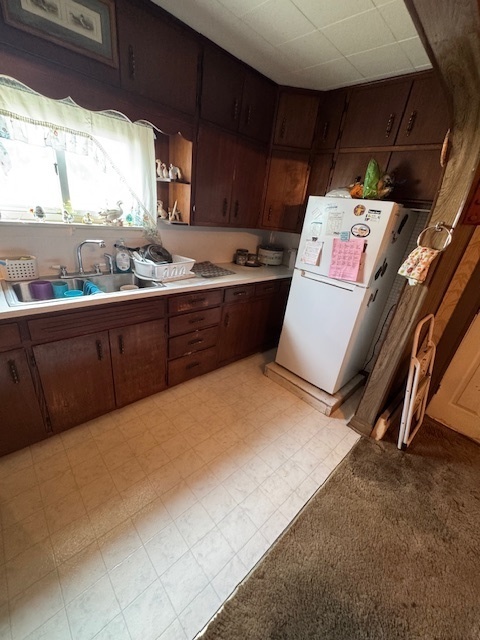 401 Adams Street Humboldt, IL 61931 - Photo 18 of 18 a room with storage and utility