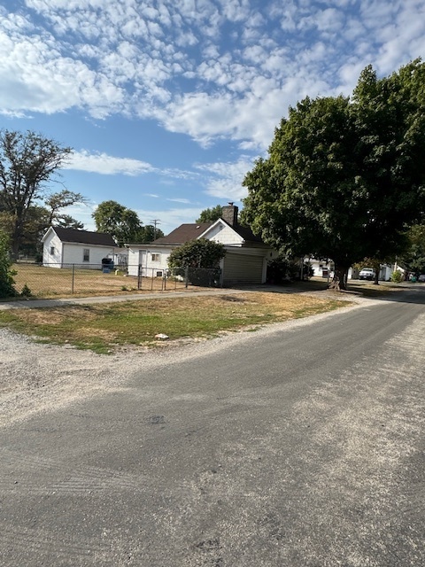401 Adams Street Humboldt, IL 61931 - Photo 3 of 18 a view of a swimming pool and a yard