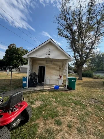 a front view of a house with patio