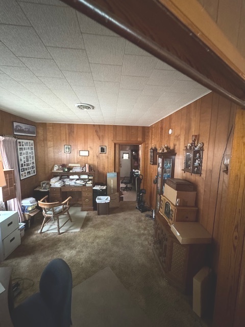401 Adams Street Humboldt, IL 61931 - Photo 10 of 18 a living room with lots of furniture and white walls