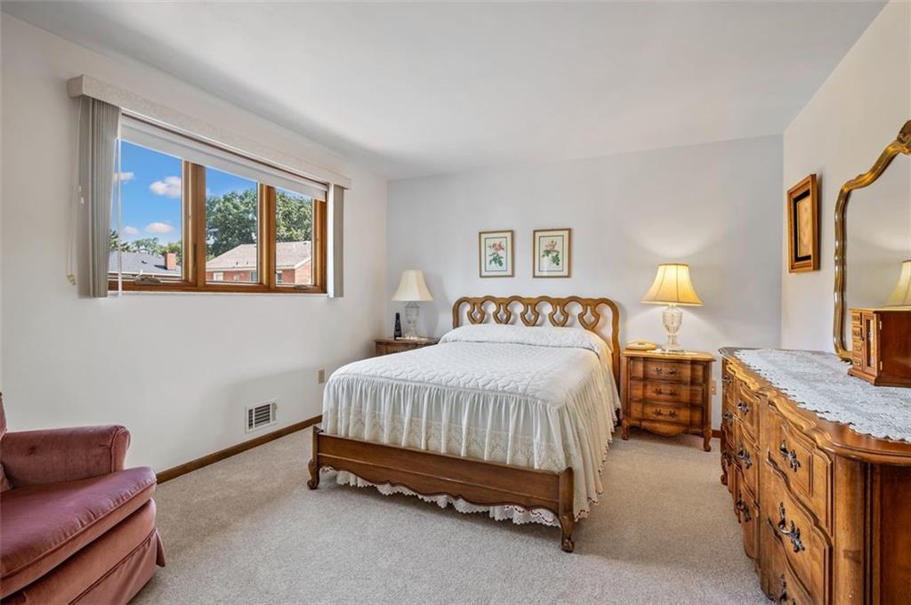 236 Philander Street Pittsburgh, PA 15218 - Photo 23 of 35 a bedroom with a bed and window