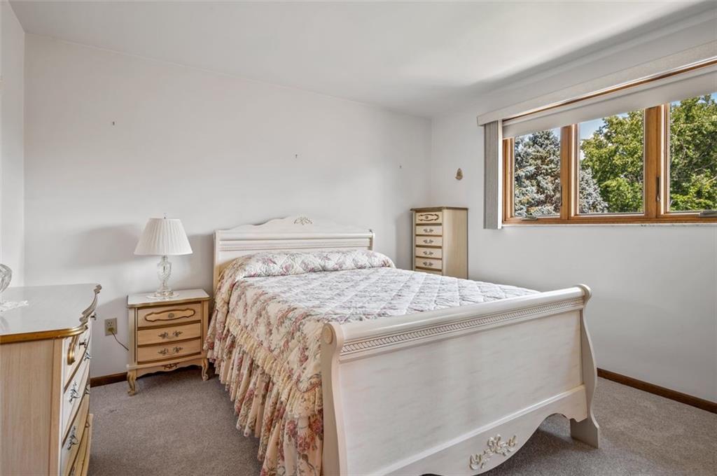 236 Philander Street Pittsburgh, PA 15218 - Photo 26 of 35 a bedroom with a bed and a window