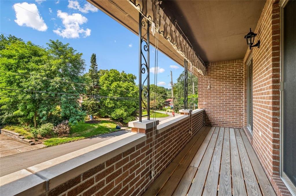 236 Philander Street Pittsburgh, PA 15218 - Photo 27 of 35 a view of balcony with wooden floor and potted plant