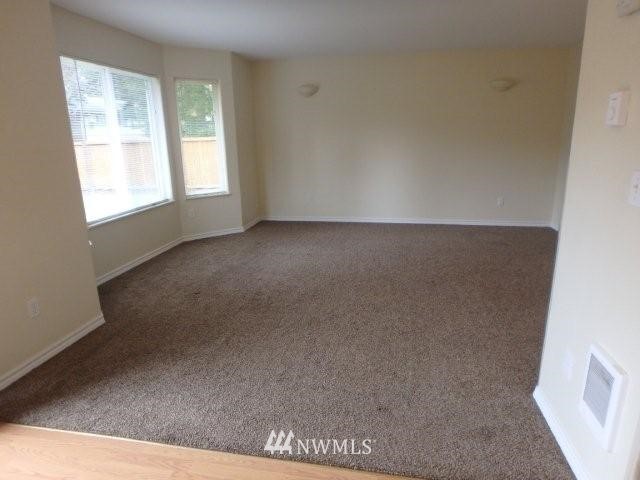 901 North Harding Road Elma, WA 98541 - Photo 3 of 22 an empty room with windows