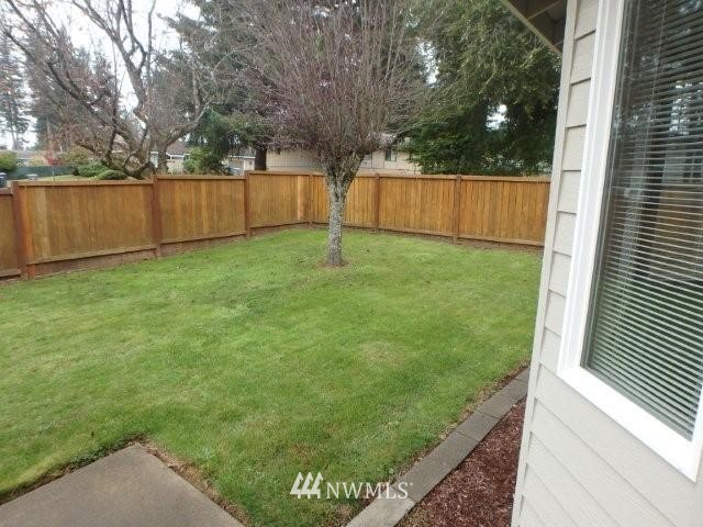 901 North Harding Road Elma, WA 98541 - Photo 7 of 22 a view of a backyard with large trees