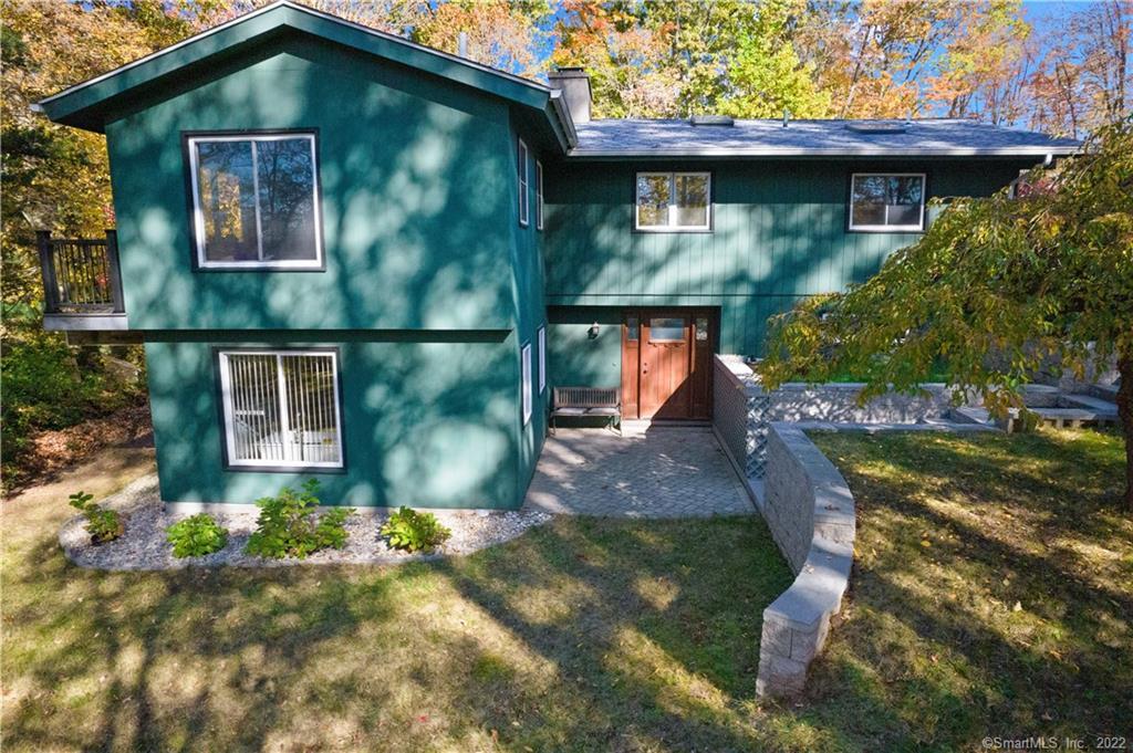 76 Tankwood Road Wallingford, CT 06492 - Photo 1 of 1 a front view of a house with garden