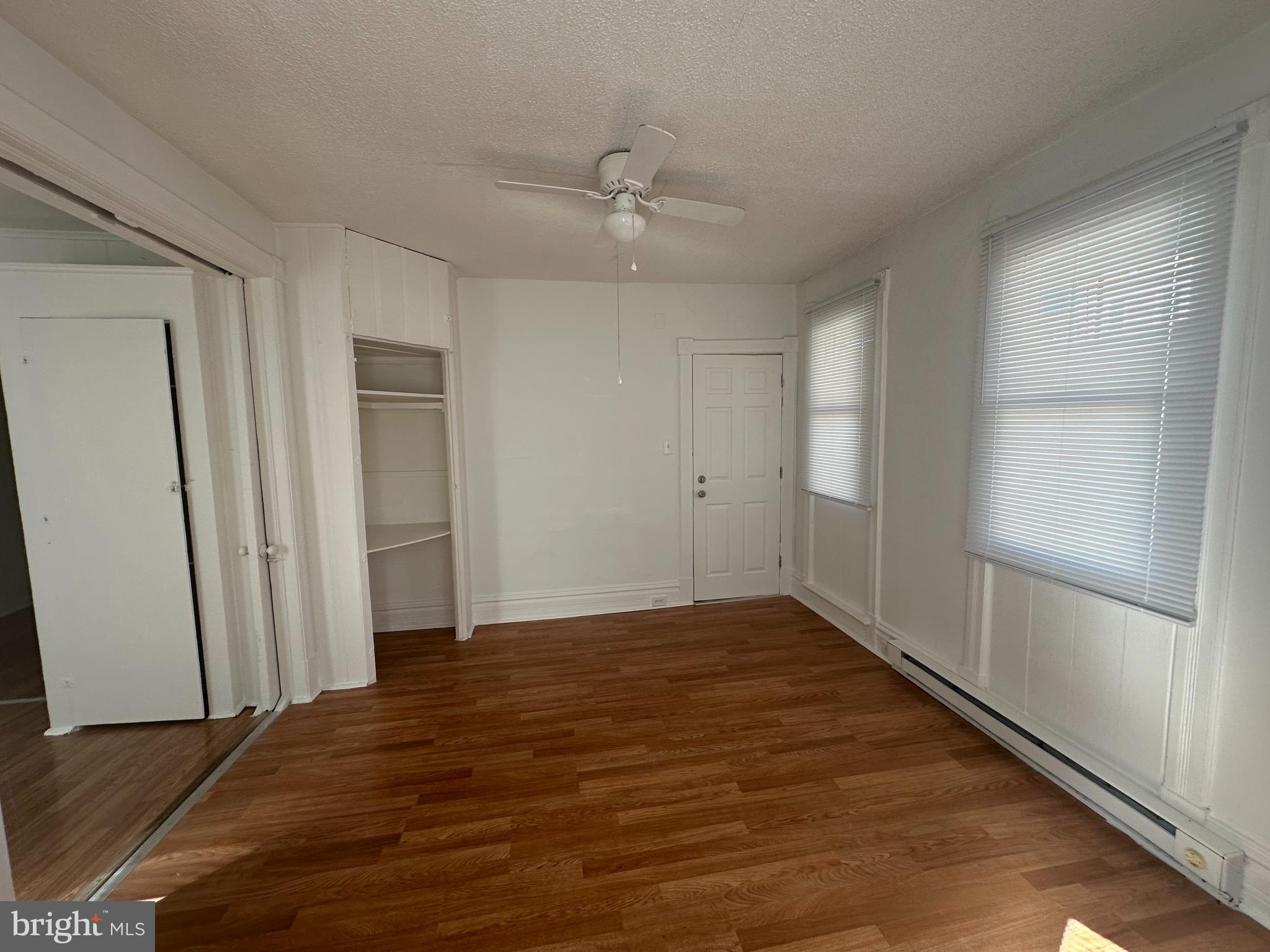 829 Concord Street, Unit A Hagerstown, MD 21740 - Photo 17 of 29 a view of empty room with wooden floor and fan