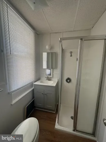 a view of a kitchen with a sink cabinets and window
