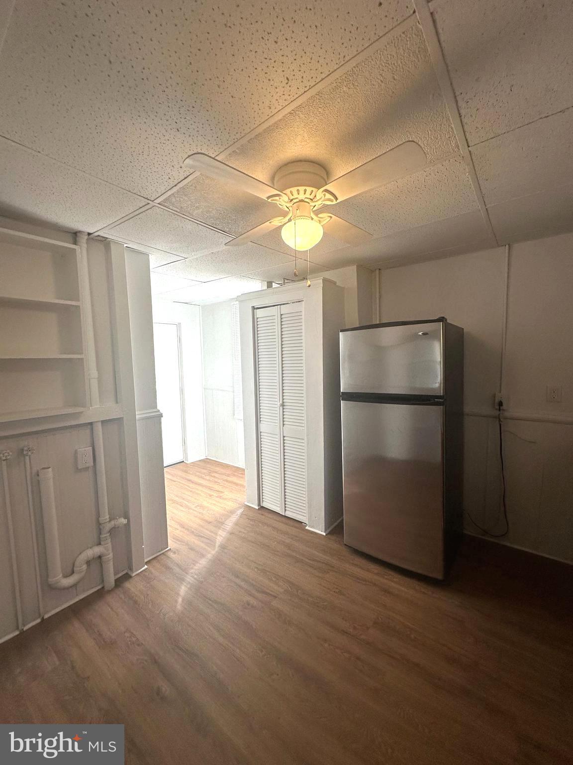 829 Concord Street, Unit A Hagerstown, MD 21740 - Photo 24 of 29 a view of an empty room with a kitchen
