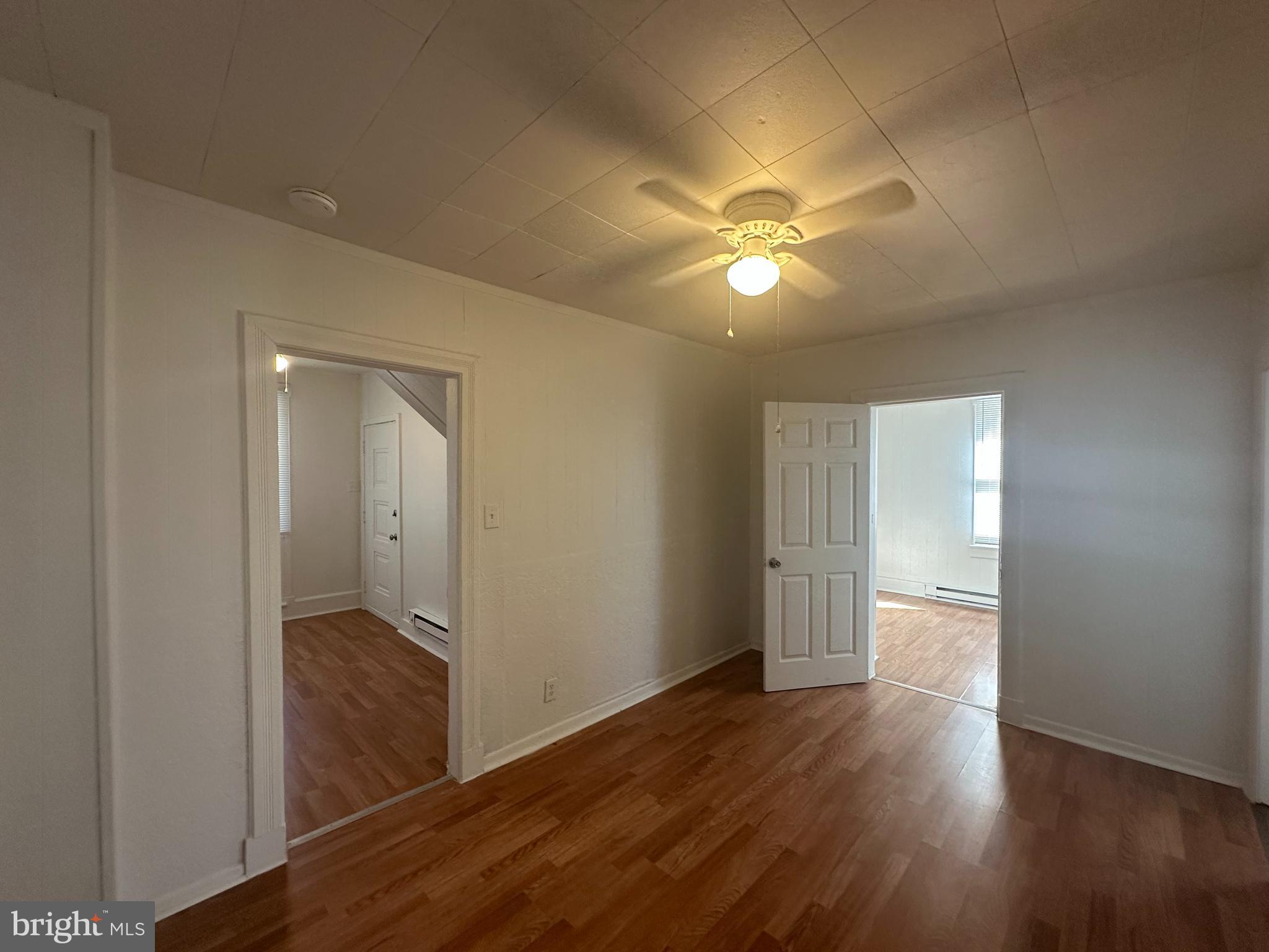 829 Concord Street, Unit A Hagerstown, MD 21740 - Photo 9 of 29 a view of empty room with wooden floor