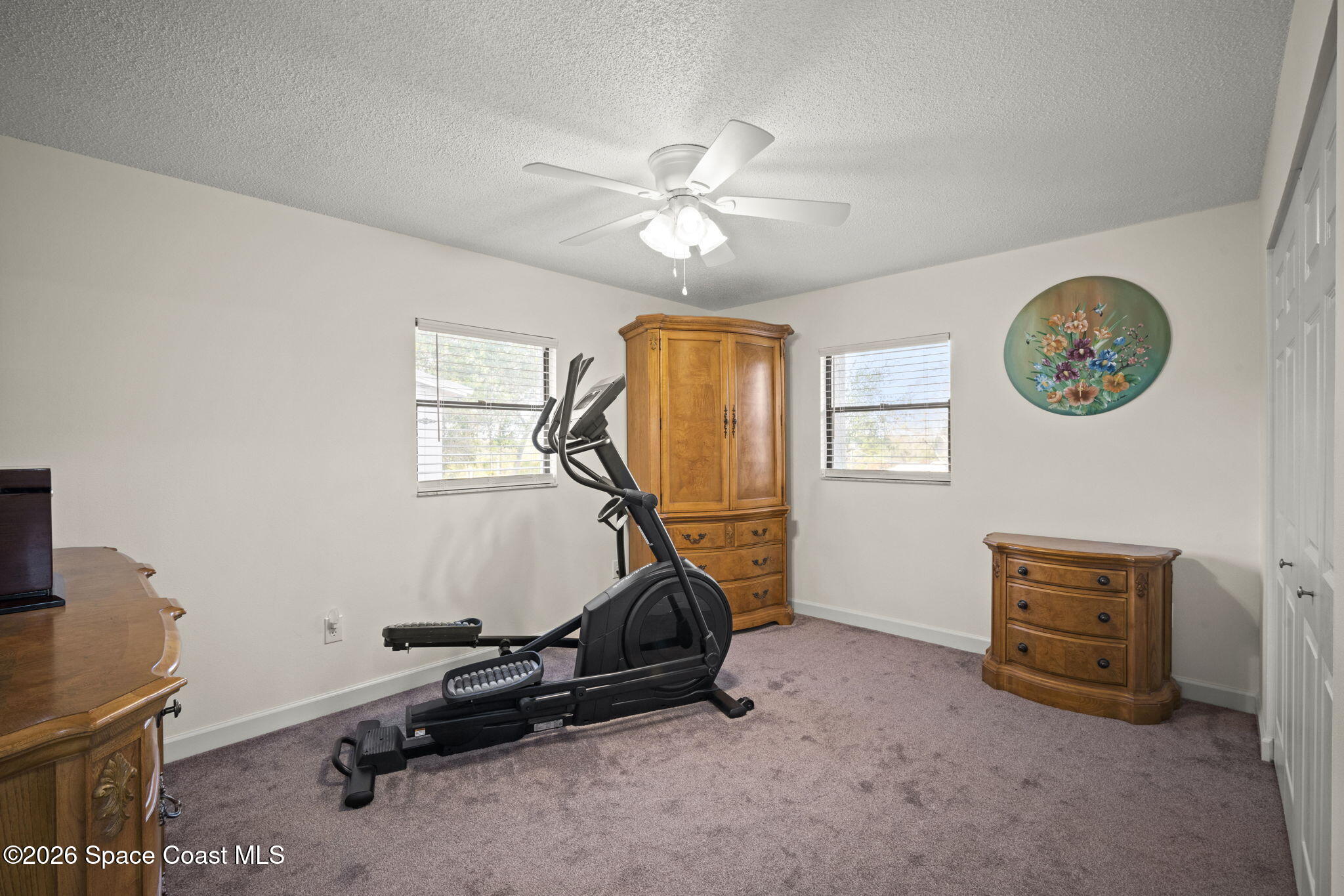 1505 South Carpenter Road Titusville, FL 32796 - Photo 26 of 36 a view of a room with gym equipment