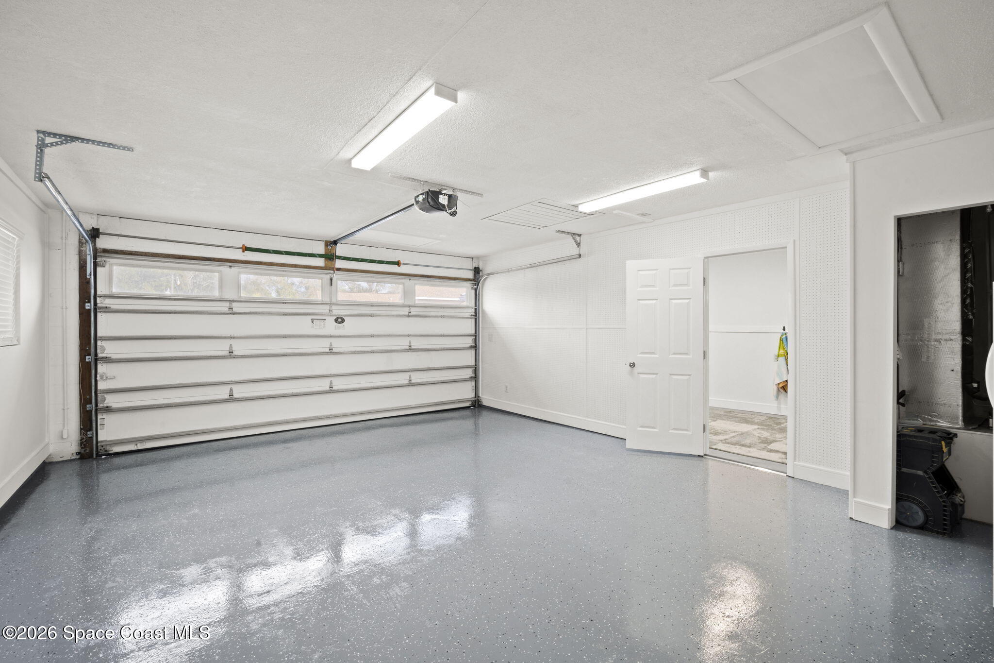 1505 South Carpenter Road Titusville, FL 32796 - Photo 31 of 36 a view of an empty room with a window