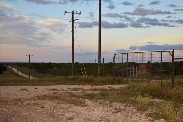 a view of house with a lake view