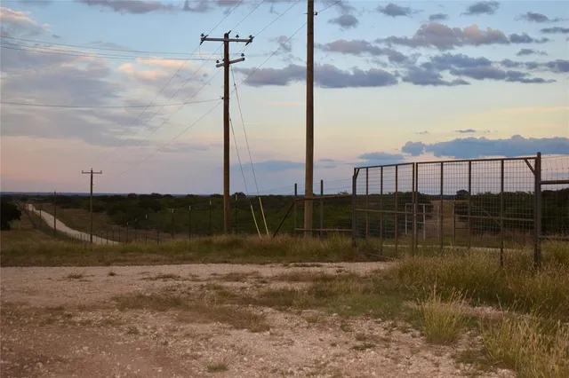 a view of house with a lake view