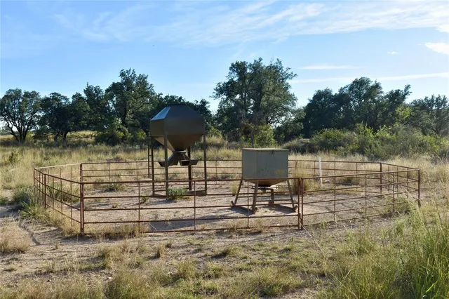 a view of lake with green space