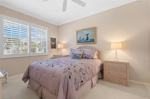 a work room with furniture and a window