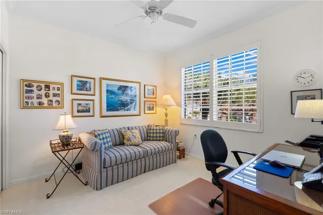 a balcony with furniture and a view of balcony