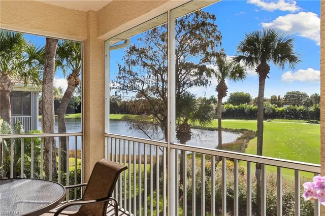 a view of a balcony with furniture