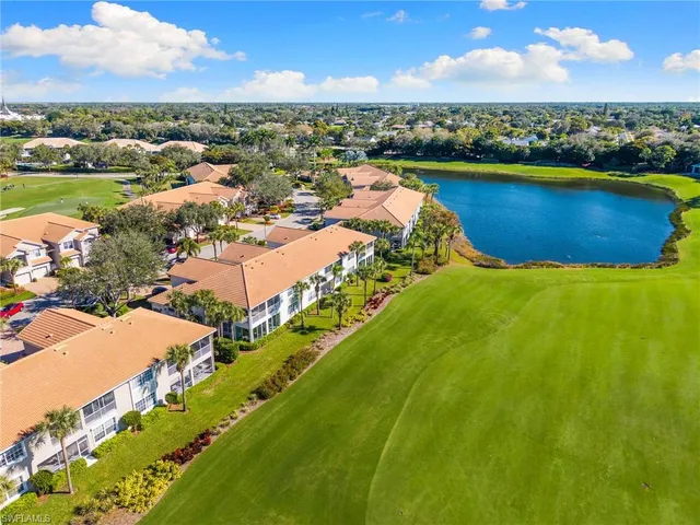 an aerial view of a house with outdoor space