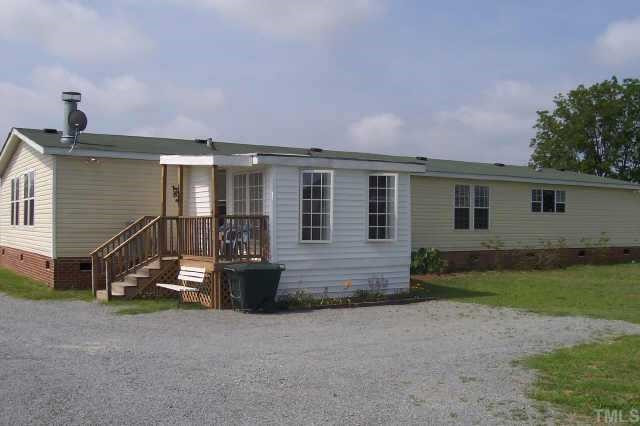 2168 Elevation Road Four Oaks, NC 27524 - Photo 7 of 9 Sunroom on back of house with heat & air Other