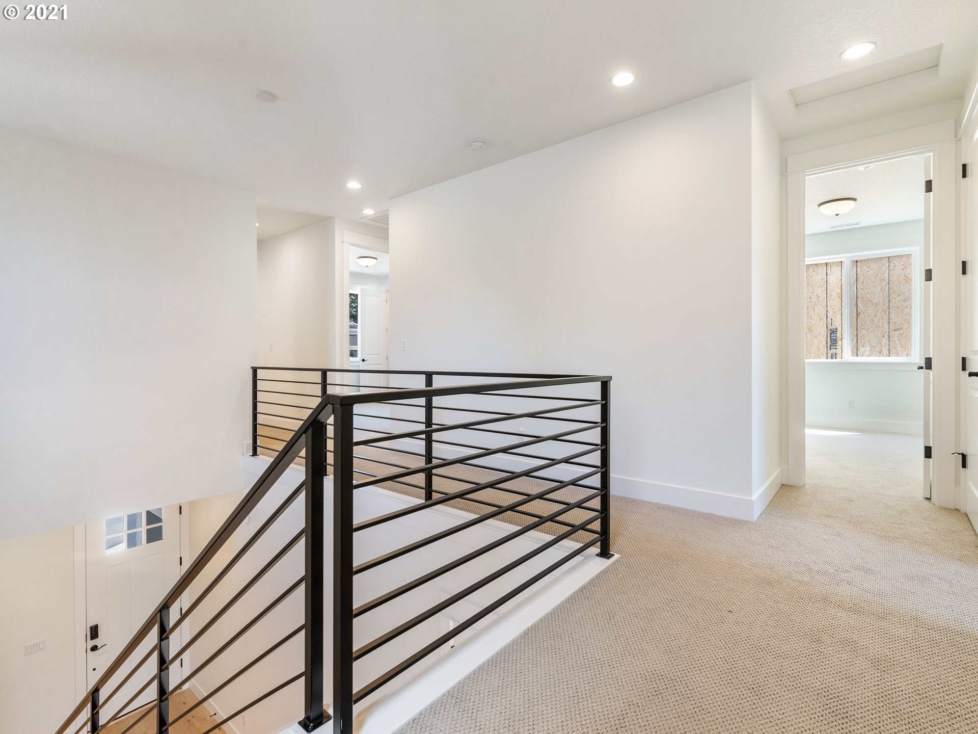 11542 Northwest Kearney Street Portland, OR 97229 - Photo 13 of 24 a view of a hallway with staircase