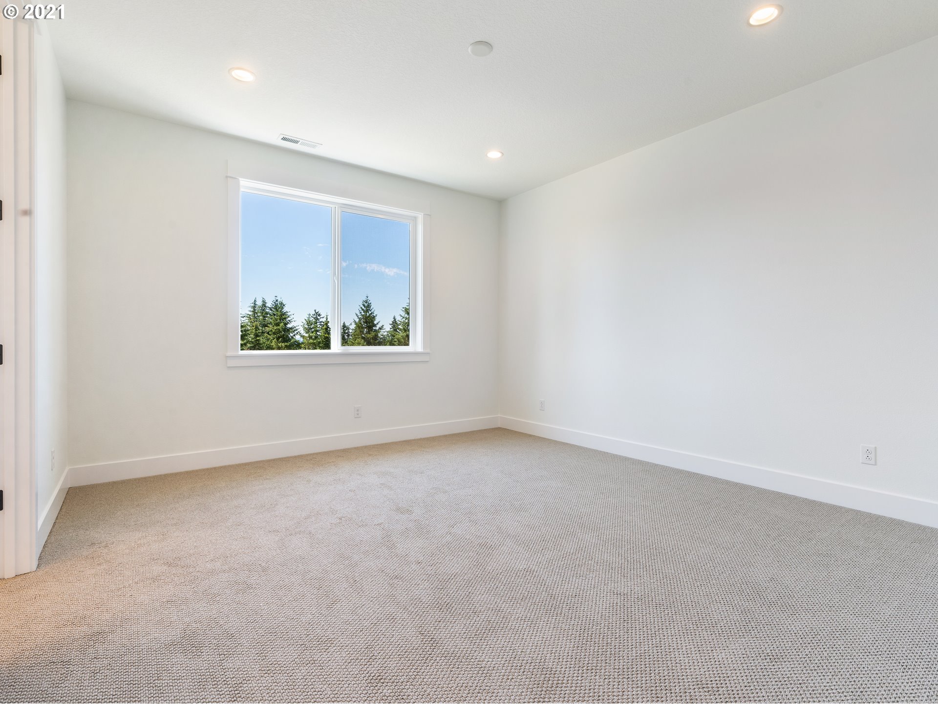 11542 Northwest Kearney Street Portland, OR 97229 - Photo 14 of 24 an empty room with a window