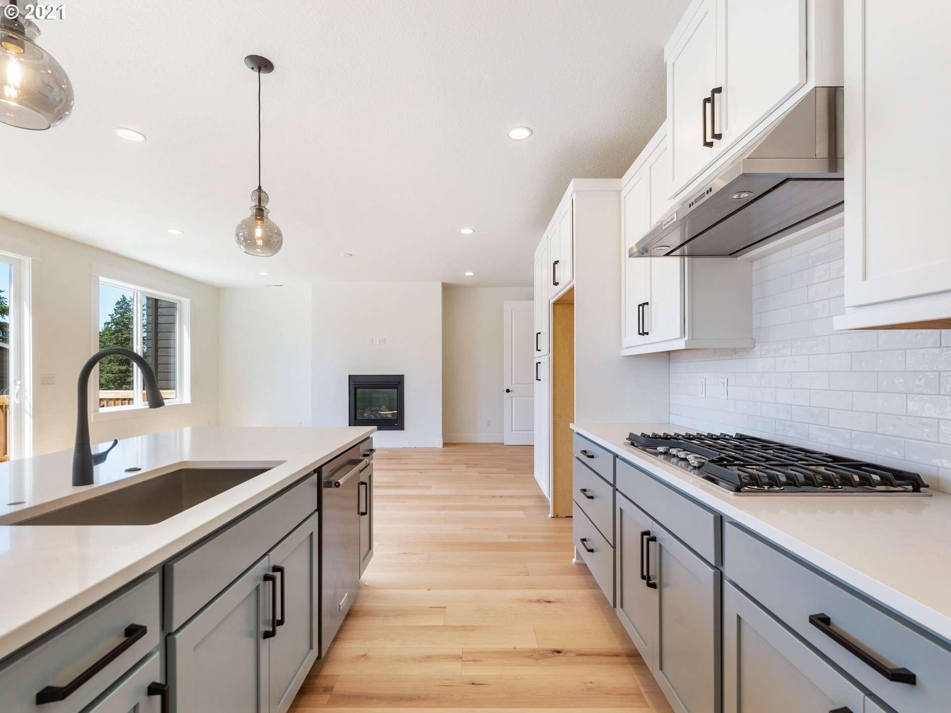 11542 Northwest Kearney Street Portland, OR 97229 - Photo 24 of 24 a kitchen with stainless steel appliances granite countertop a sink a stove and a wooden floors