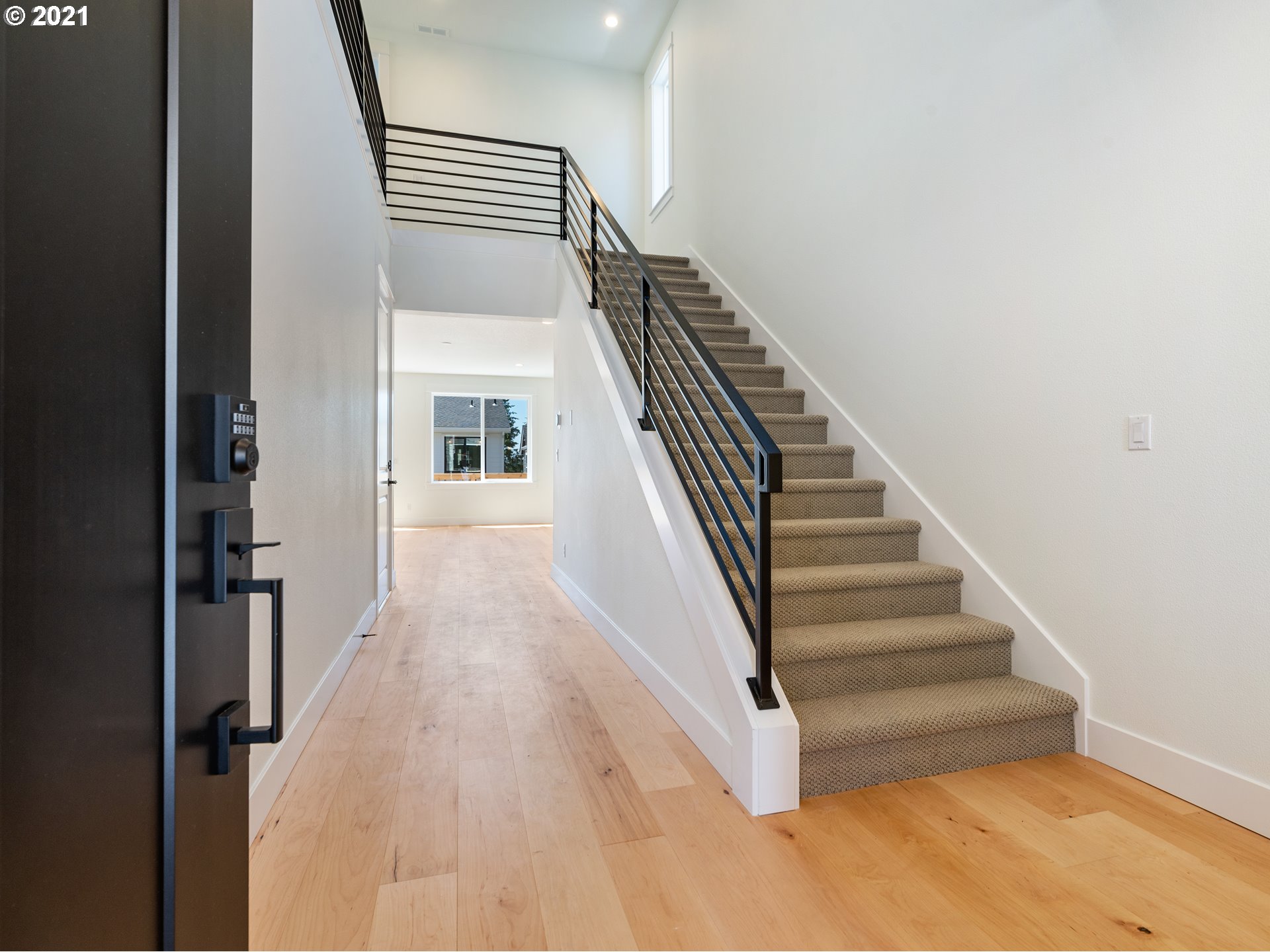 11542 Northwest Kearney Street Portland, OR 97229 - Photo 5 of 24 a view of entryway and hall with wooden floor