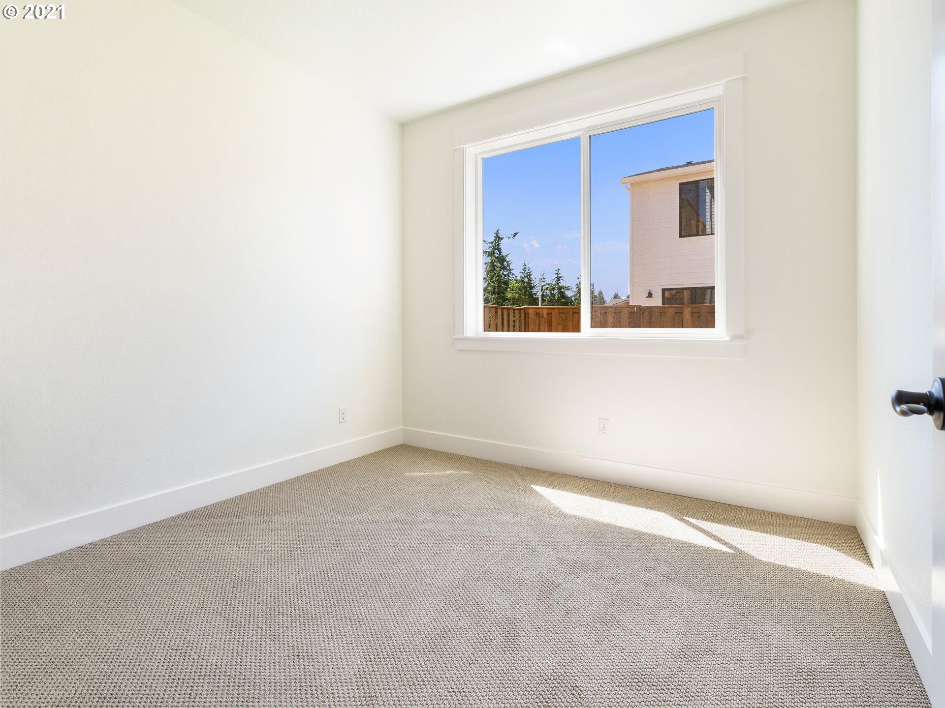 11542 Northwest Kearney Street Portland, OR 97229 - Photo 10 of 24 an empty room with windows