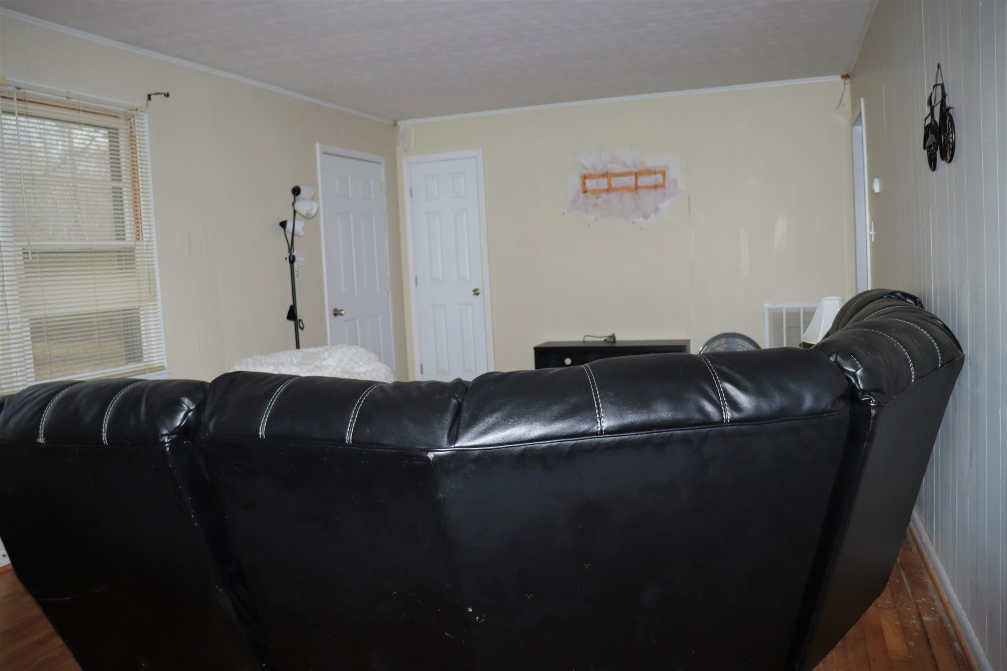176 Pine Street Parsons, TN 38363 - Photo 11 of 32 a black and white cabinet with a black the white door