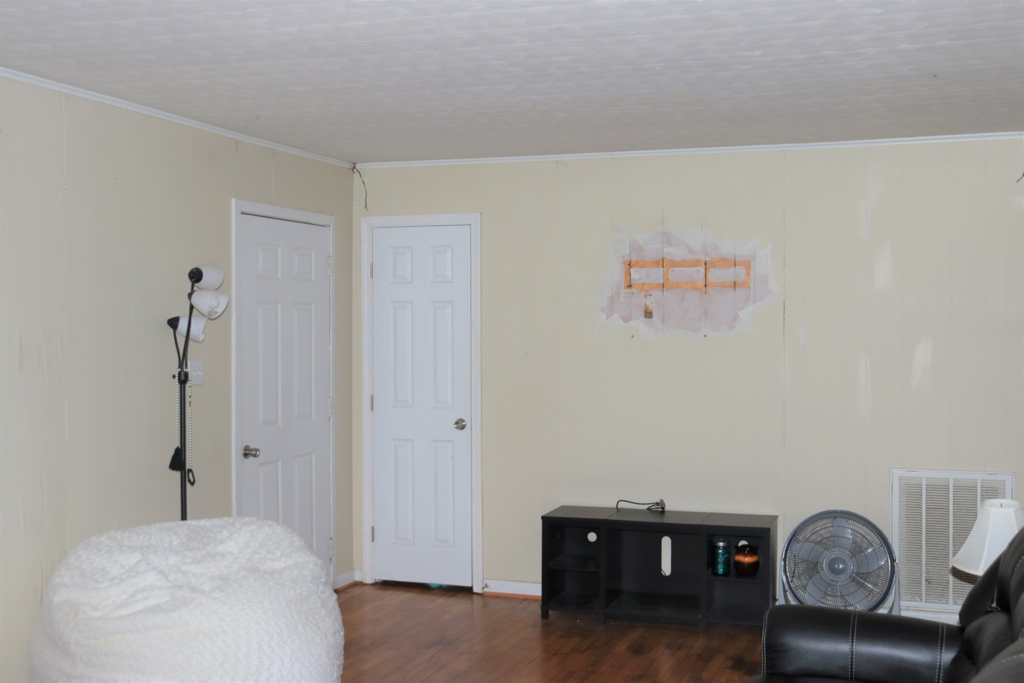 176 Pine Street Parsons, TN 38363 - Photo 12 of 32 a bedroom with a bed and furniture