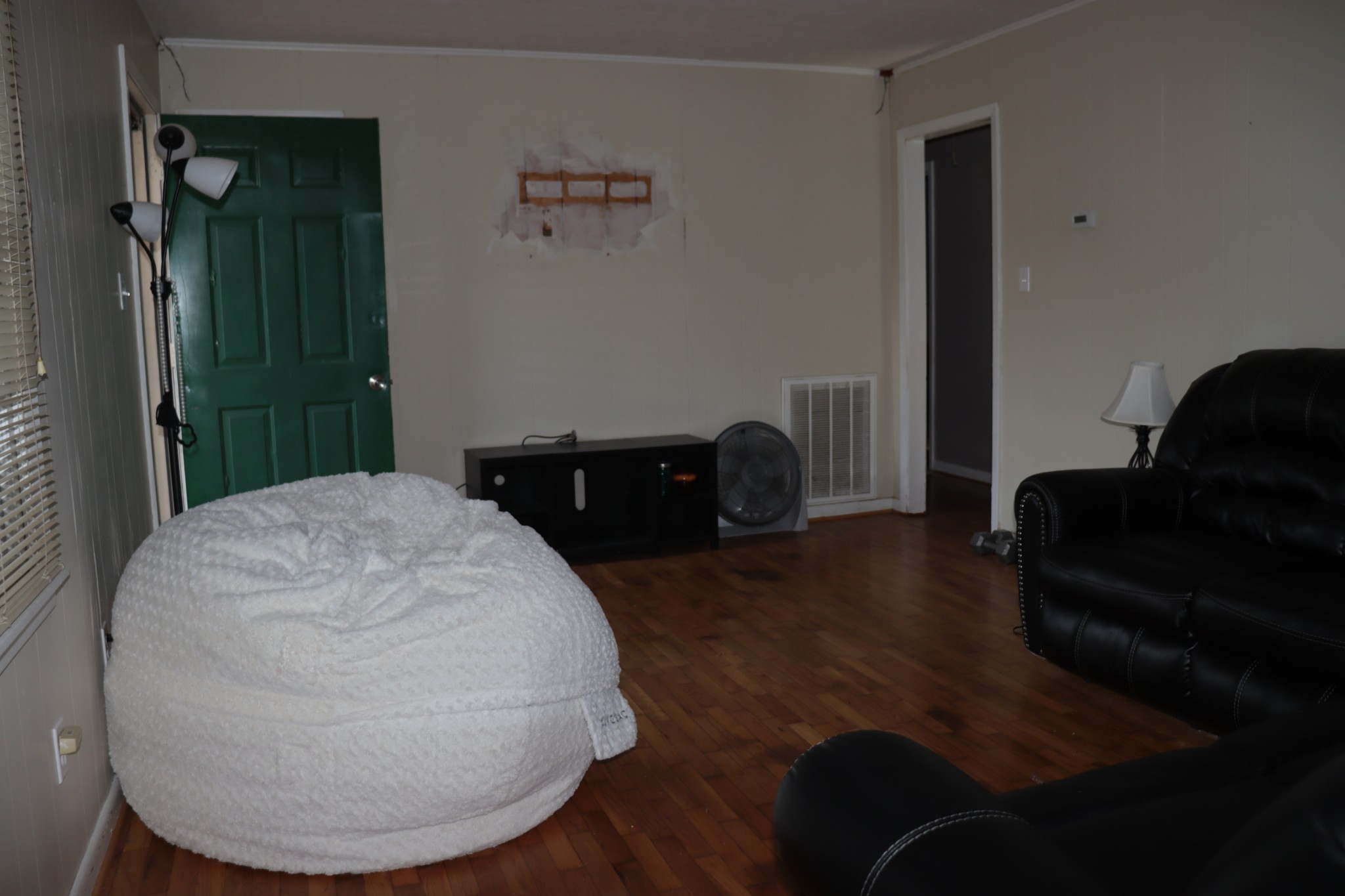 176 Pine Street Parsons, TN 38363 - Photo 19 of 32 a view of a livingroom with furniture and wooden floor