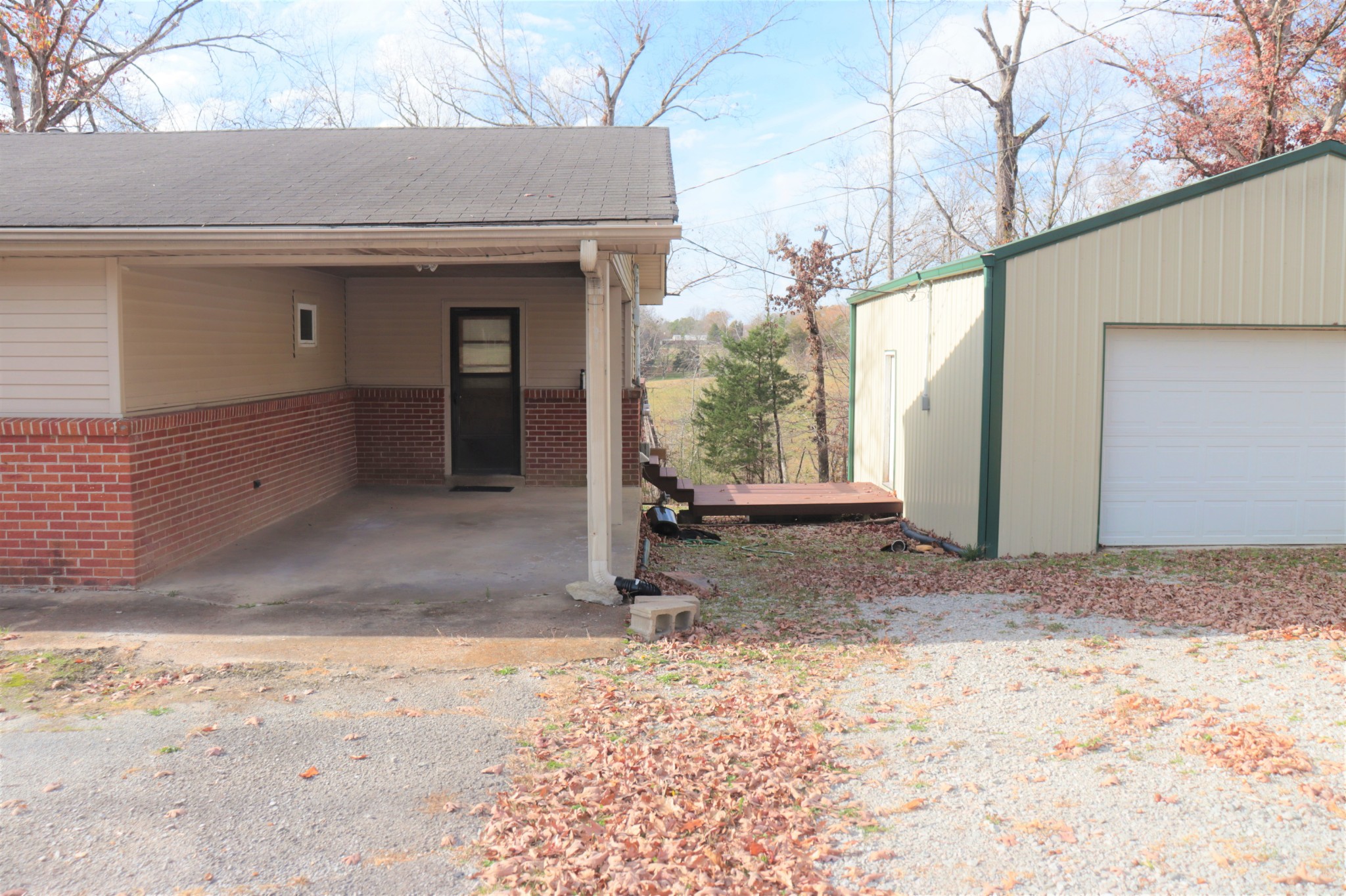 176 Pine Street Parsons, TN 38363 - Photo 4 of 32 a view of a house with a yard