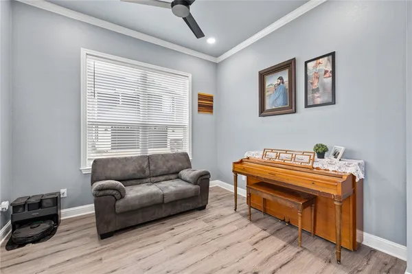a living room with furniture and a window