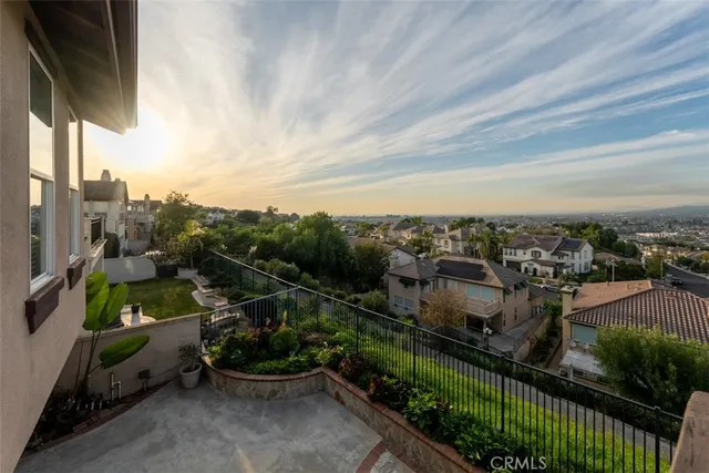 a view of a road with a building in the background