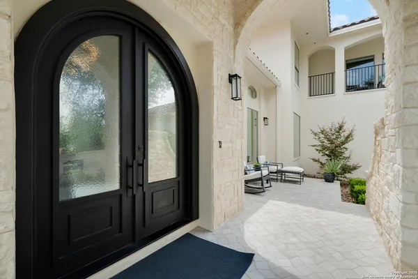a view of an entryway with sitting space