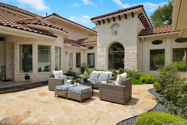 an aerial view of a house with outdoor space and street view