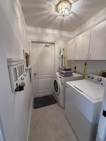 a house with swimming pool in front of it