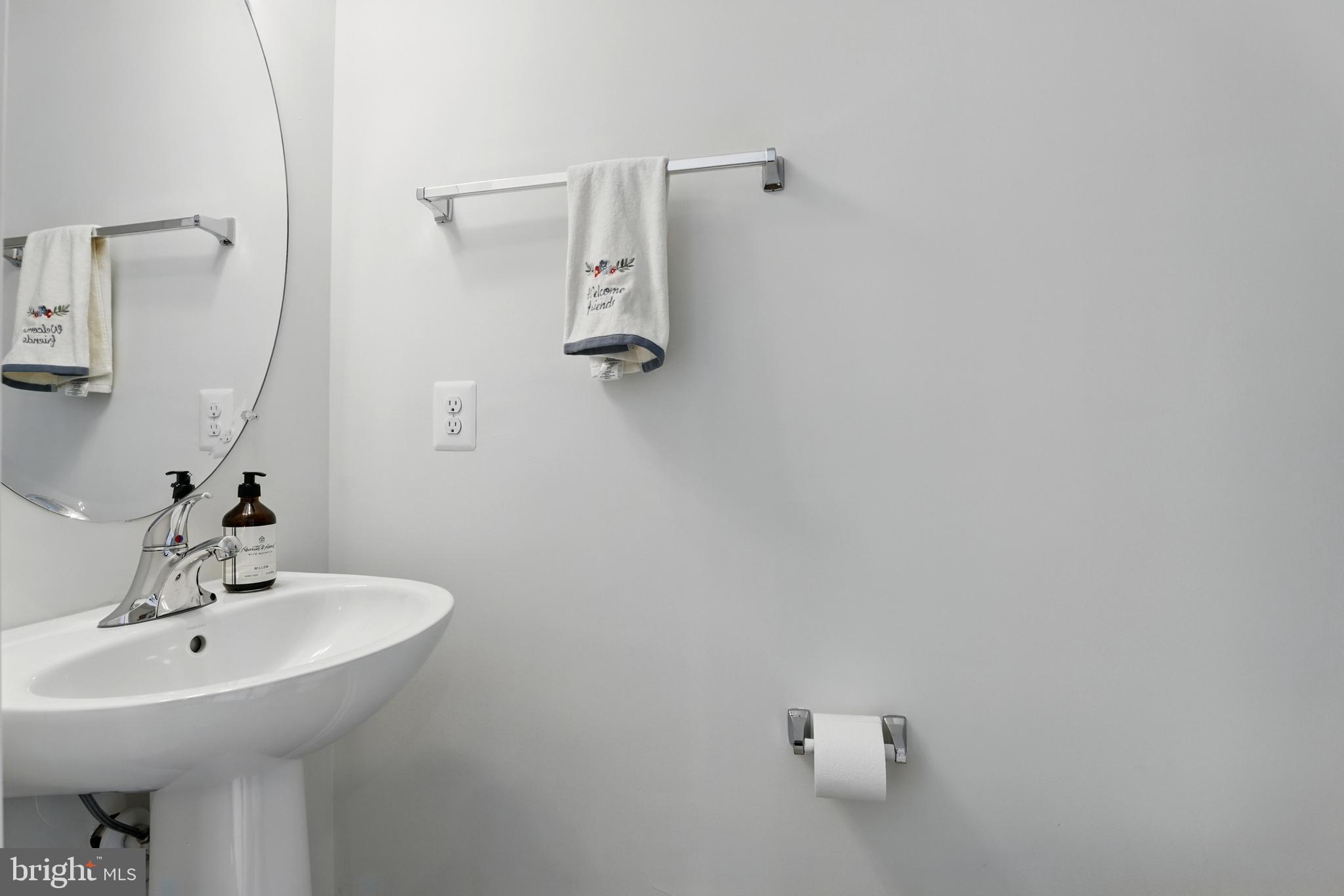 4140 Legato Road, Unit 47 Fairfax, VA 22033 - Photo 6 of 23 a bathroom with a sink and mirror