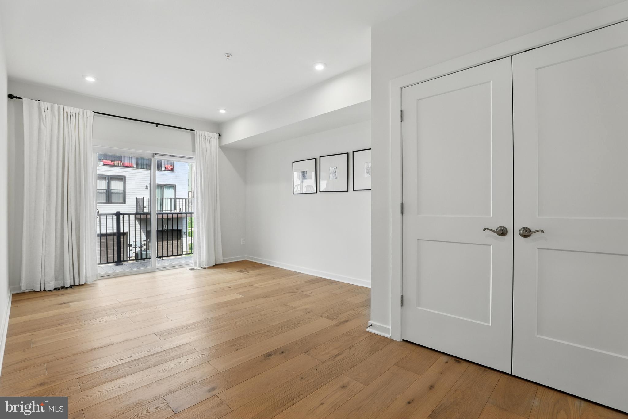 4140 Legato Road, Unit 47 Fairfax, VA 22033 - Photo 9 of 23 a view of a livingroom with wooden floor