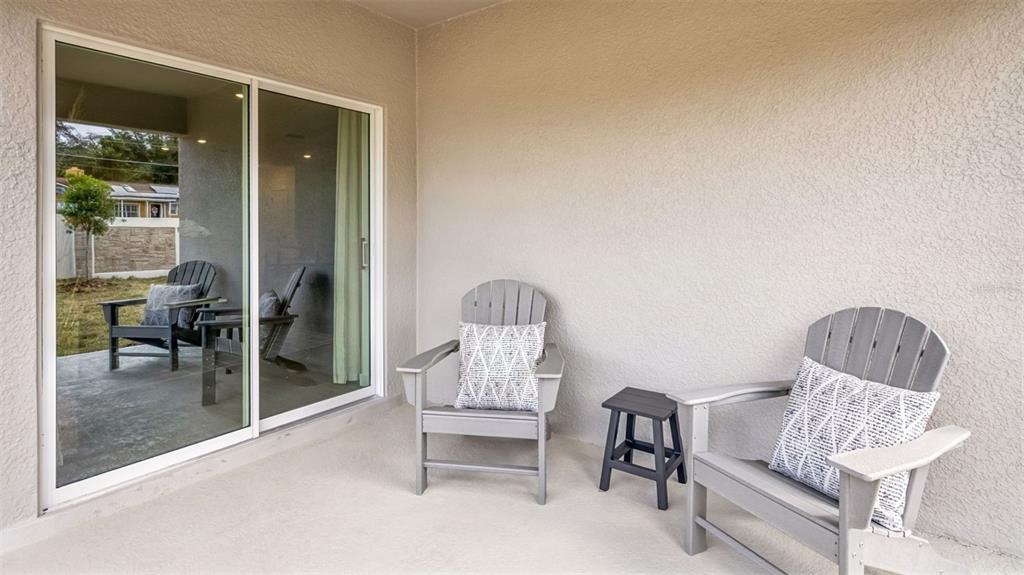 2869 House Finch Road St. Cloud, FL 34773 - Photo 19 of 56 a living room with furniture